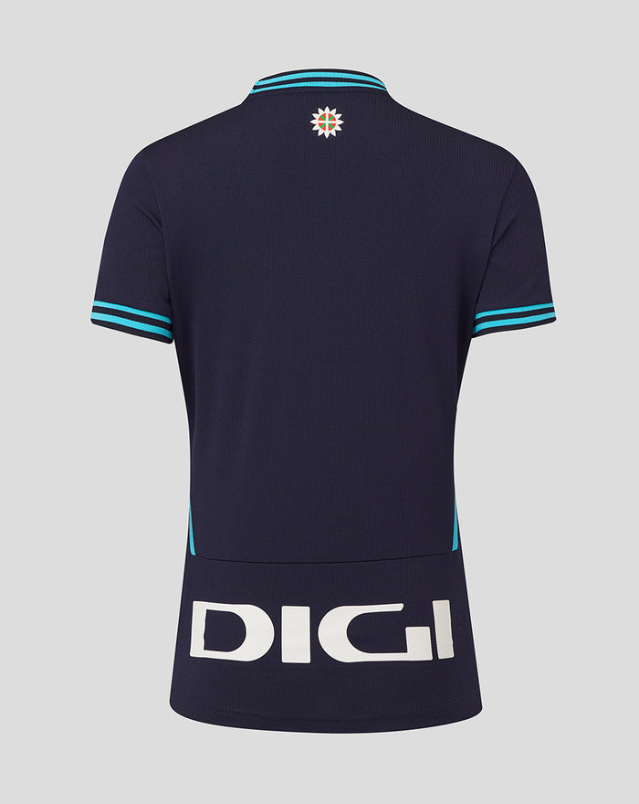 Back view of navy Womens Athletic Club Away Short Sleeve Shirt showing turquoise trimmed sleeves and collar and large DIGI sponsor text across the lower back.