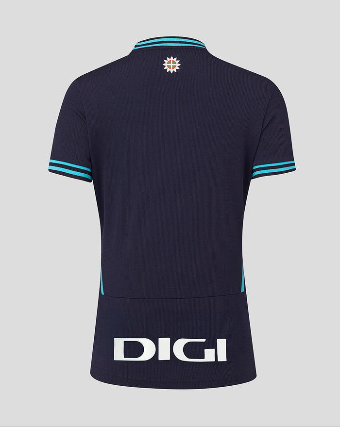 Back view of navy Athletic Club away shirt with turquoise collar and sleeve trim, crest at upper back and bold DIGI logo at hem.