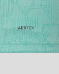 Collar area of turquoise Athletic Club shirt with Castore branding on the neckline.