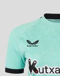 Turquoise Athletic Club shirt close up with Castore logo and Kutxa sponsor across the front.