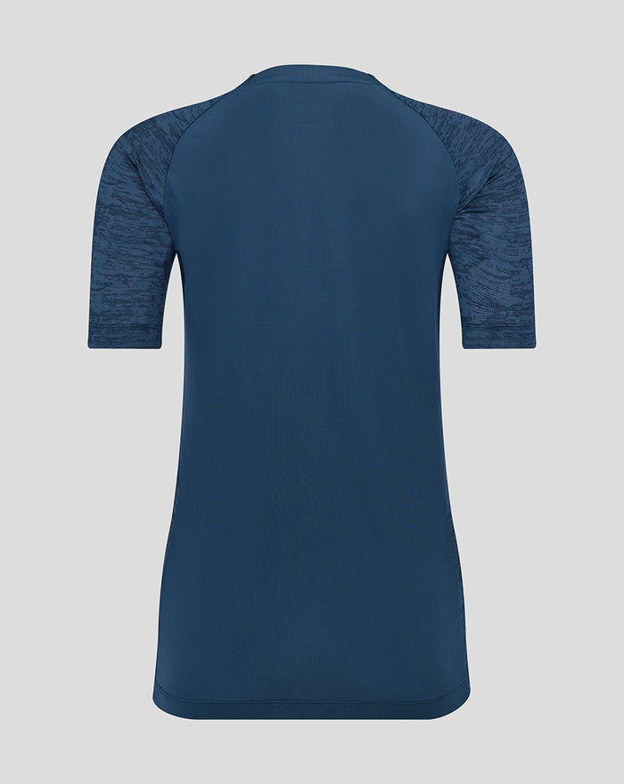 Back view of a navy Athletic Club performance tee with marled sleeves and light teal side panels.