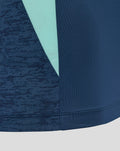 Detail of the hem and teal side panel on the navy Athletic Club tee with textured fabric.
