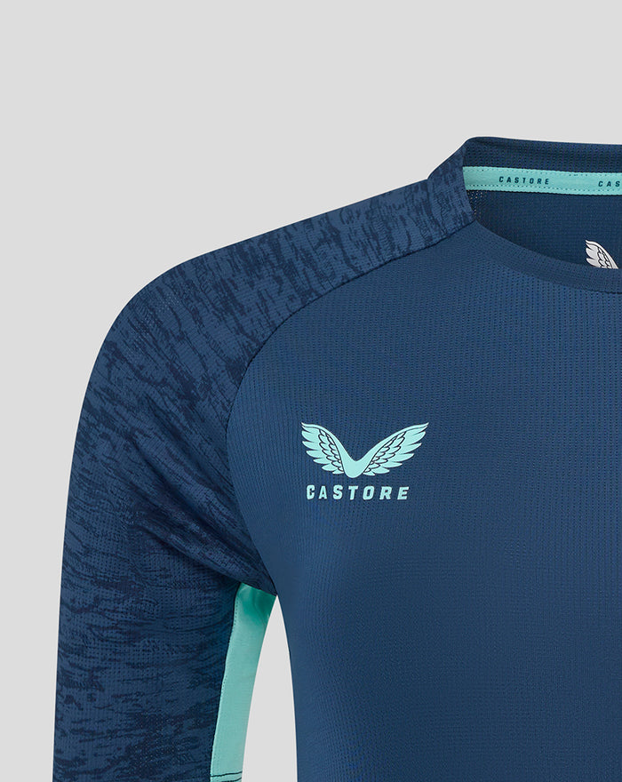 Close-up of the navy Athletic Club tee front with Castore logo on right chest and left chest crest.