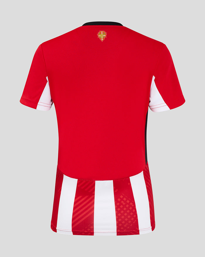 Back view of red women's home short sleeve shirt with striped lower back panel and club crest at the neck