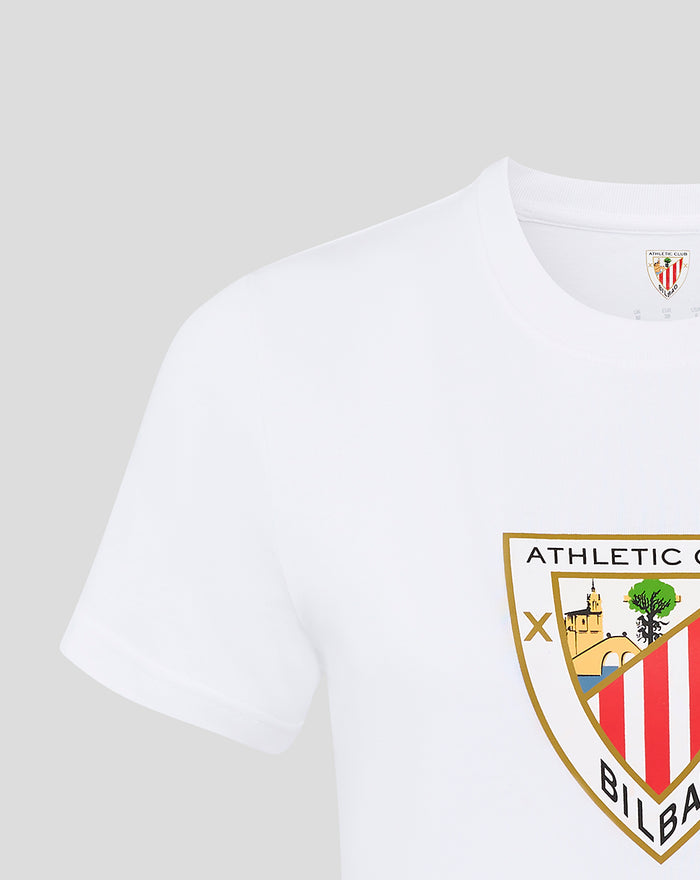 Close up of neckline and shoulder on the white crest tee with part of the crest visible