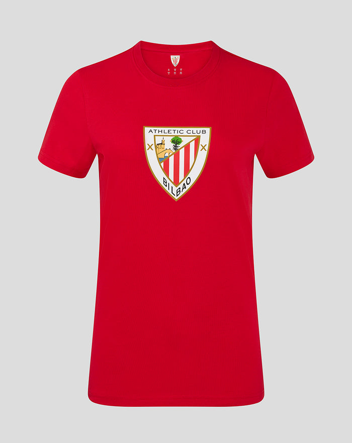 Red women's crest tee with shield logo on the chest.