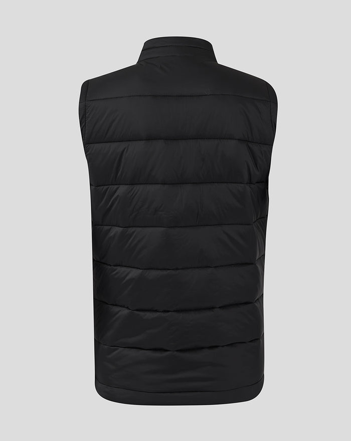 Back view of a black quilted women's core gilet