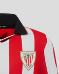 Close-up of upper back showing Athletic Club crest on left chest and black polo collar on red white striped jersey