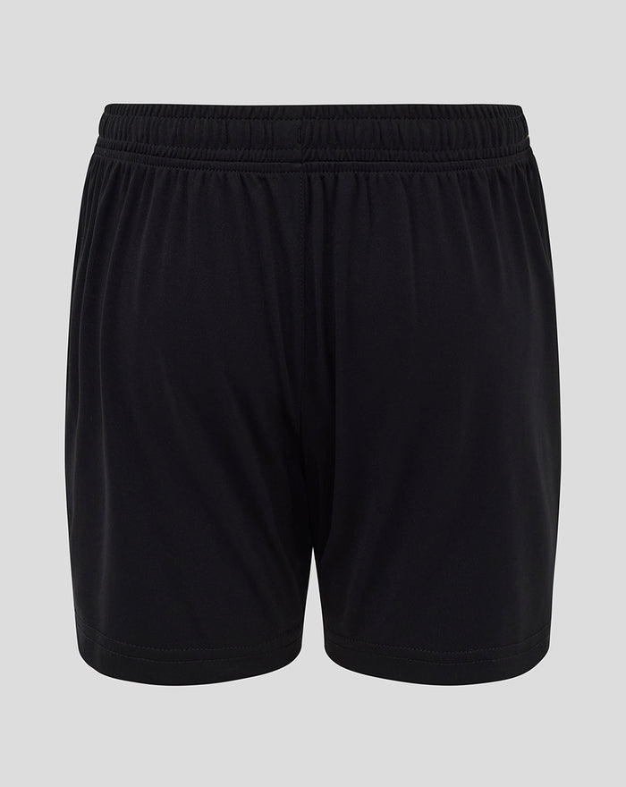 Back view of black junior athletic shorts with elastic waistband
