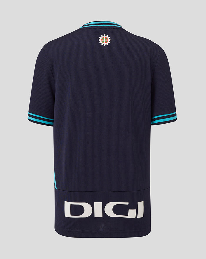 Back view of navy Junior Athletic Club Away Shirt with crest at upper back and turquoise collar and cuffs