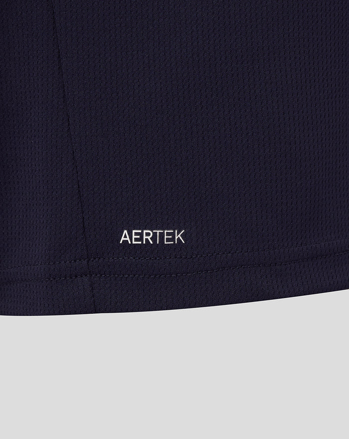 Close up of navy Athletic Club fabric with AerTek label at hem