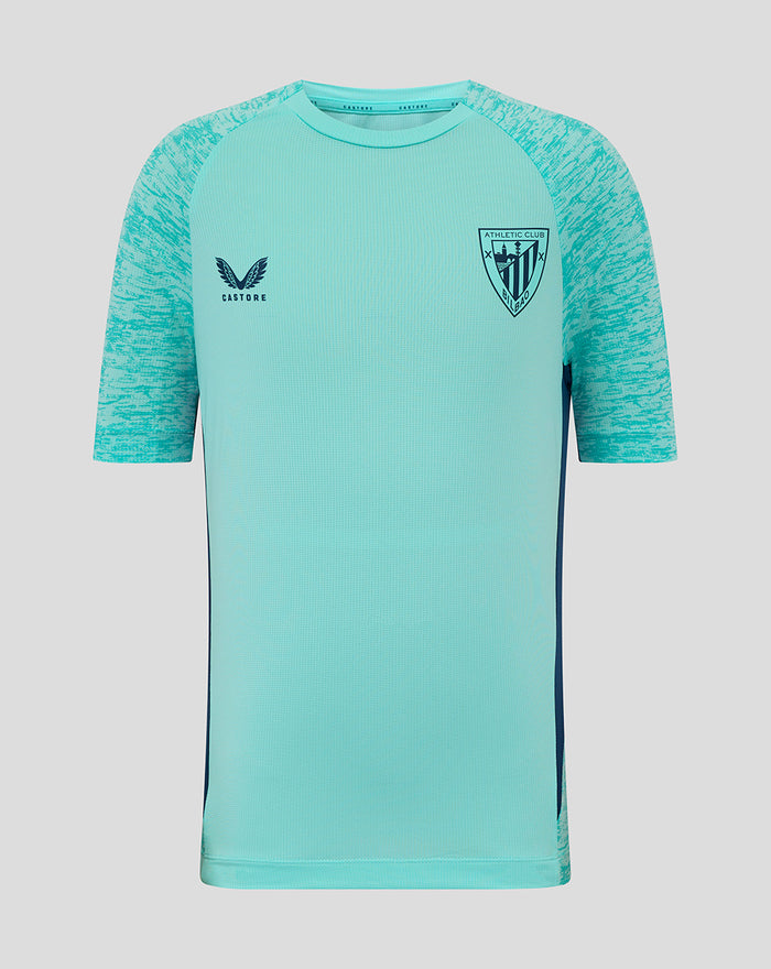 Front view of turquoise junior Athletic Club short sleeve tee with patterned sleeves, Castore logo on right chest and Athletic Club crest on left chest.
