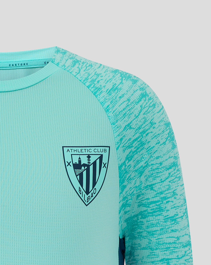 Close up of left chest showing Athletic Club crest on turquoise tee with heather sleeves.