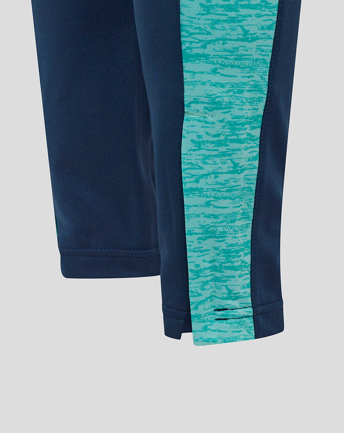 Junior Athletic Club training knit pants in navy with turquoise side panels, side pockets and club crest on the thigh