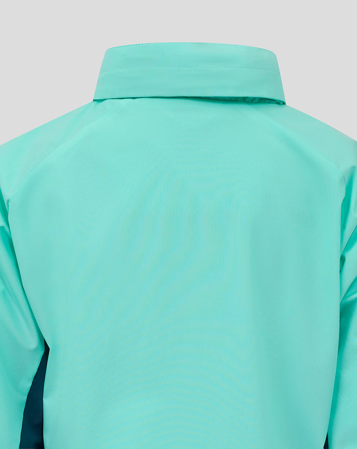 Back view of turquoise hooded packable shower jacket showing the collar.