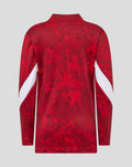 Back view of red junior Athletic Club Home Pre Match Midlayer Top with abstract print and white sleeve accents.