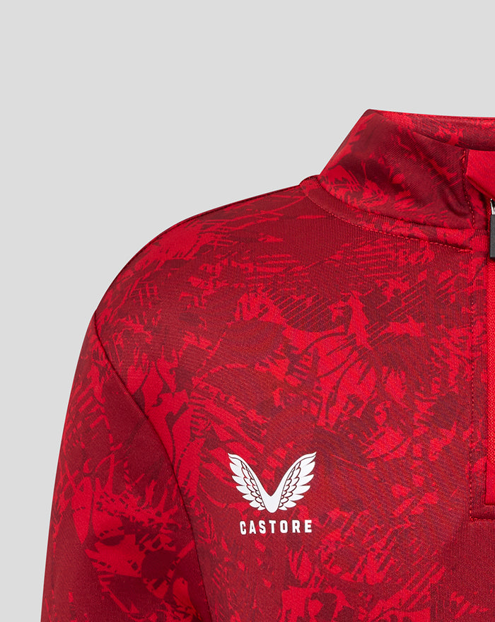 Close up of red Athletic Club Midlayer showing Castore logo and Athletic Club crest on the chest