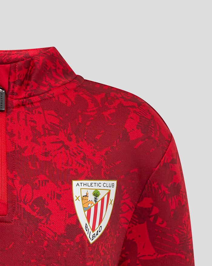 Red Athletic Club Junior Home Pre Match Midlayer Top with abstract print and chest Castore and Athletic Club logos
