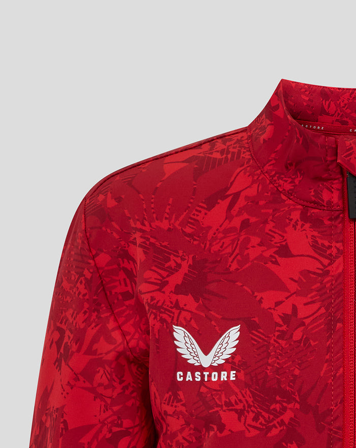 Close-up of the red camo junior jacket chest showing Castore logo