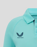 Turquoise junior athletic polo with winged Castore logo on the chest