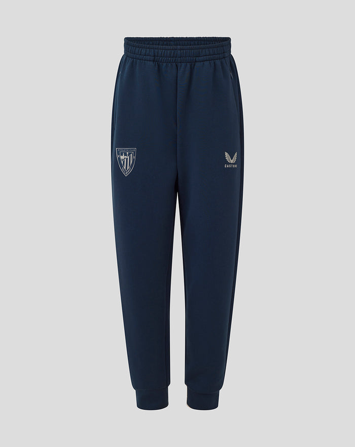 Navy Athletic Club travel knit pant for juniors with crest badge on the left leg and Castore logo on the right