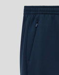 Close-up of navy travel knit pant waist showing elastic waistband and small zip pocket