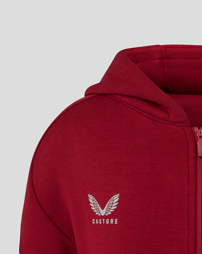 Close-up of shoulder and hood on the red athletic club hoodie featuring Castore logo