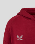 Close-up of red hooded sweatshirt showing the hood and Castore logo on the chest