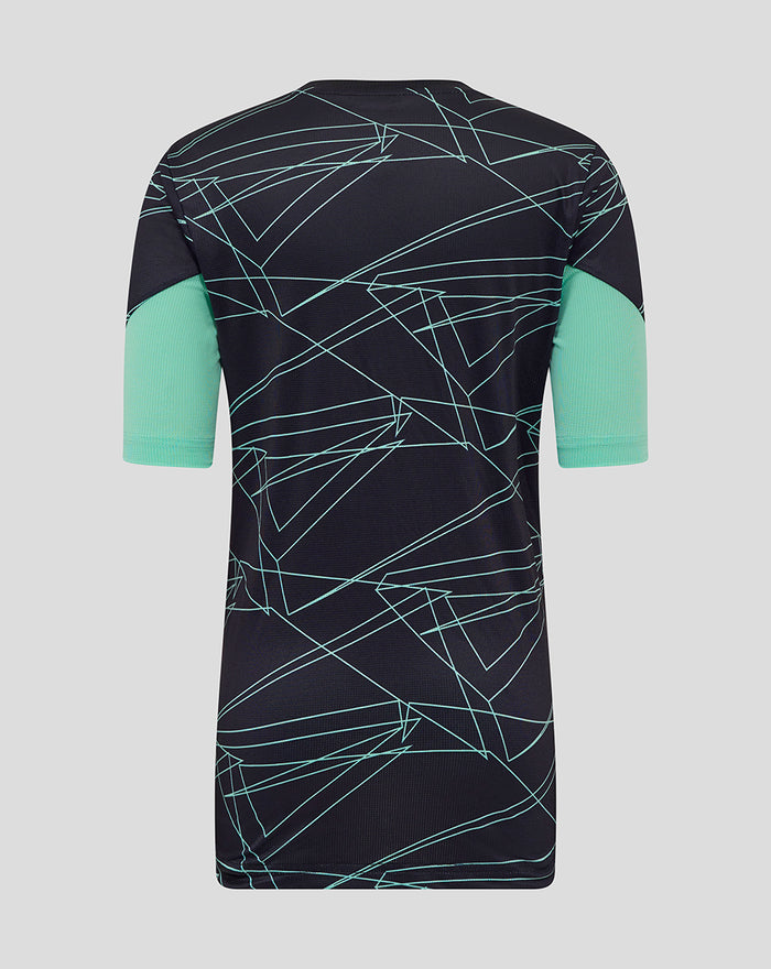Back view of navy junior Athletic Club third pre match short sleeve tee with mint sleeves and turquoise geometric print