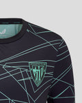 Close up of chest area on navy junior Athletic Club tee with turquoise crest and angular line pattern