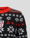 Close up of the black junior Athletic Club Christmas jumper showing a red knit collar and zigzag trim with crest on the chest.