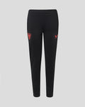 Front view of black junior Tech Fleece jog pants with red Athletic Club Bilbao crest on the left thigh and a red winged logo on the right thigh