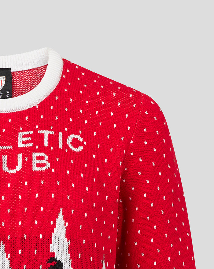 Close up of red Christmas sweater with white ribbed collar and dotted pattern and Athletic Club text.
