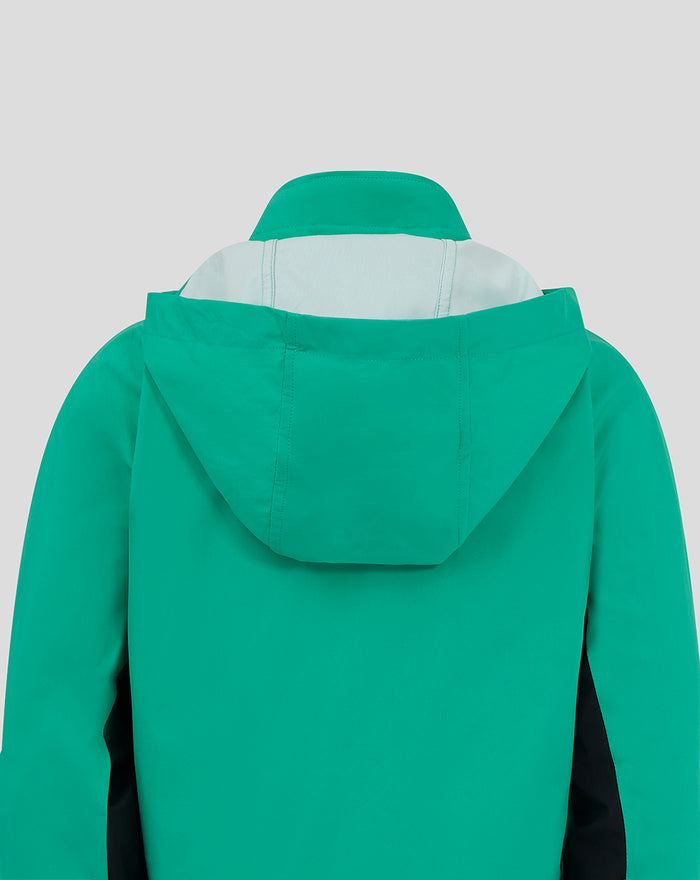 Back view of green hooded training rain jacket with light interior collar lining.
