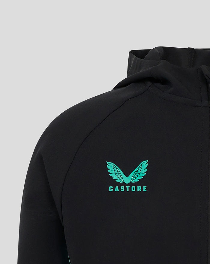 Close-up of teal Castore logo on the jacket chest.