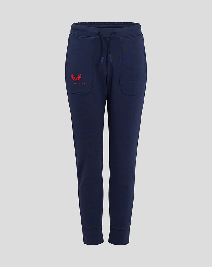 Front view of navy Junior Athletic Club Travel Pant with external drawcords front pockets and ribbed cuffs