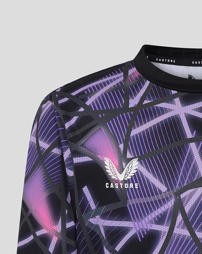 Junior Third Matchday T-shirt 24/25 close-up of upper chest showing Castore logo and purple geometric pattern.