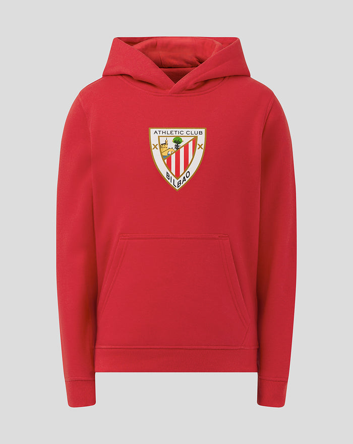 Red junior hoodie with a large front crest badge on the chest
