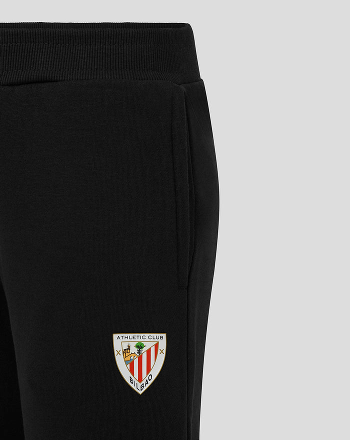 Close up of black joggers thigh showing an Athletic Club Bilbao crest patch