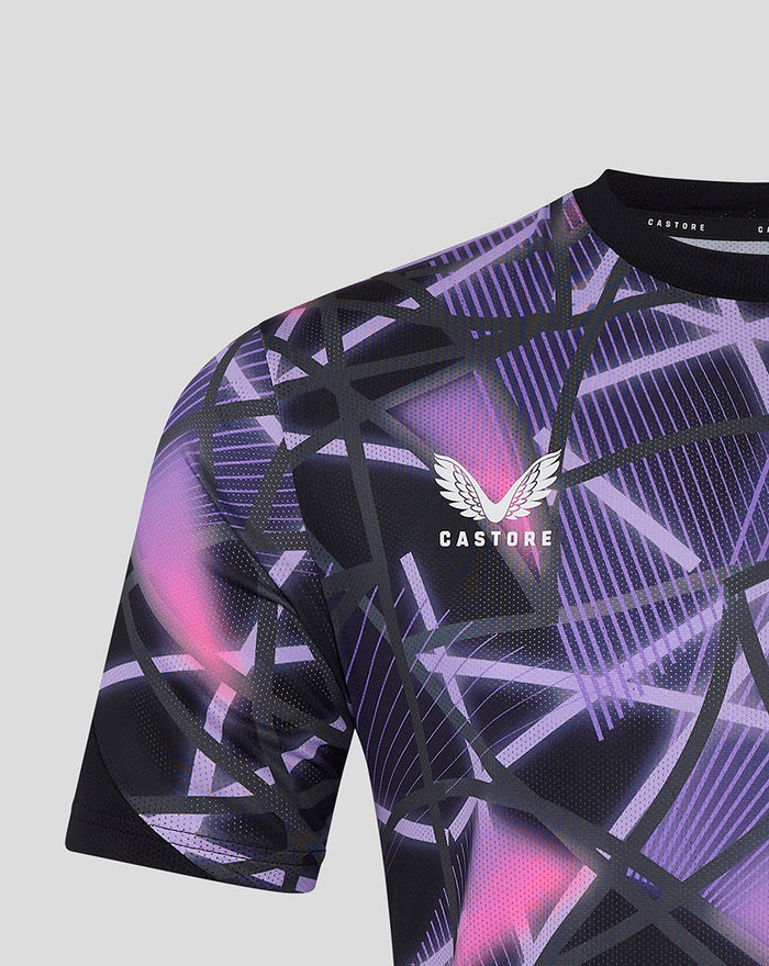 Partial view of Third Matchday T shirt 24/25 in purple with geometric print and white Castore wing logo on the chest