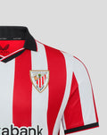 Close-up of polo collar and crest on Athletic Club home shirt with red white stripes and Castore logo