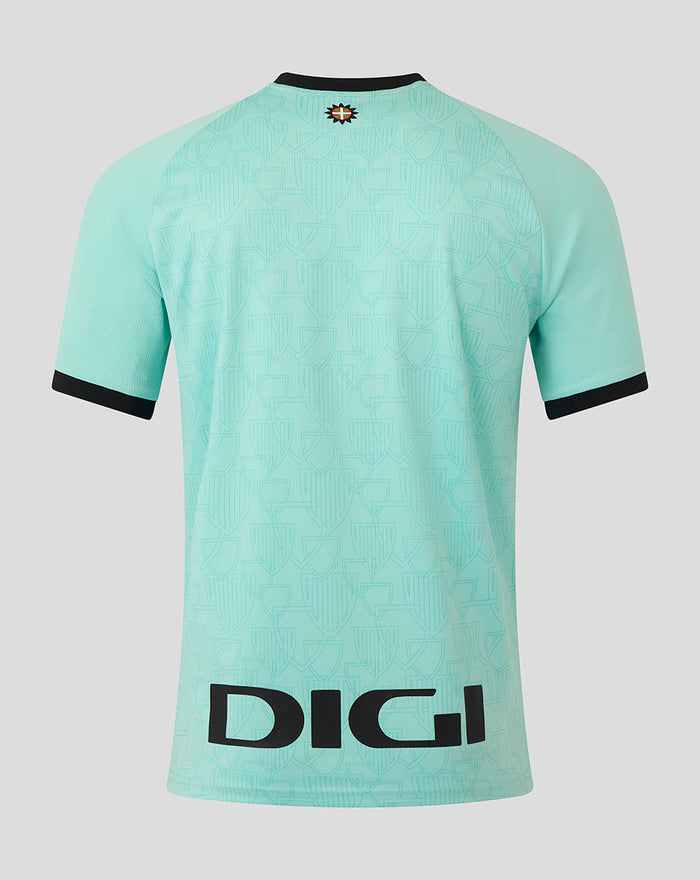 Back view of turquoise Athletic Club third short sleeve shirt showing a repeating crest pattern and bold DICI at the hem