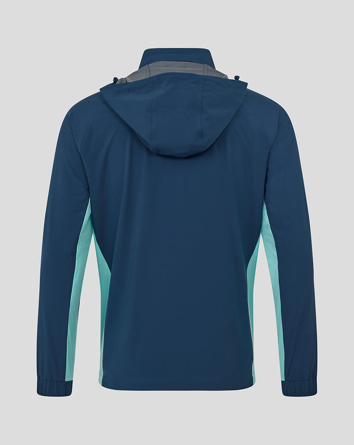 Back view of a moonlit ocean athletic hooded shower jacket in deep blue with light teal side panels.