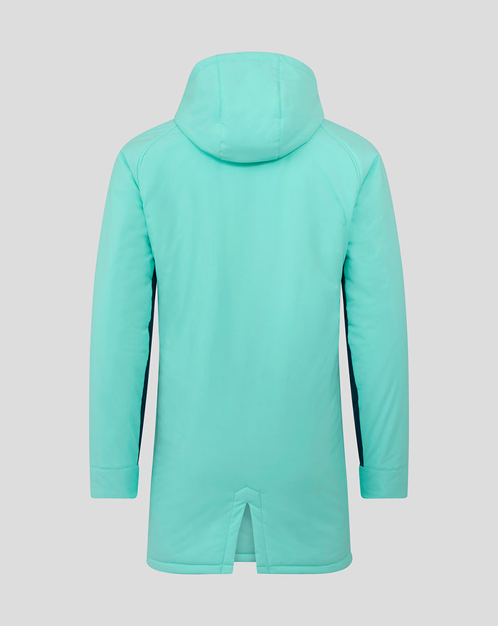 Back view of a bright turquoise padded hooded jacket with a vent at the hem