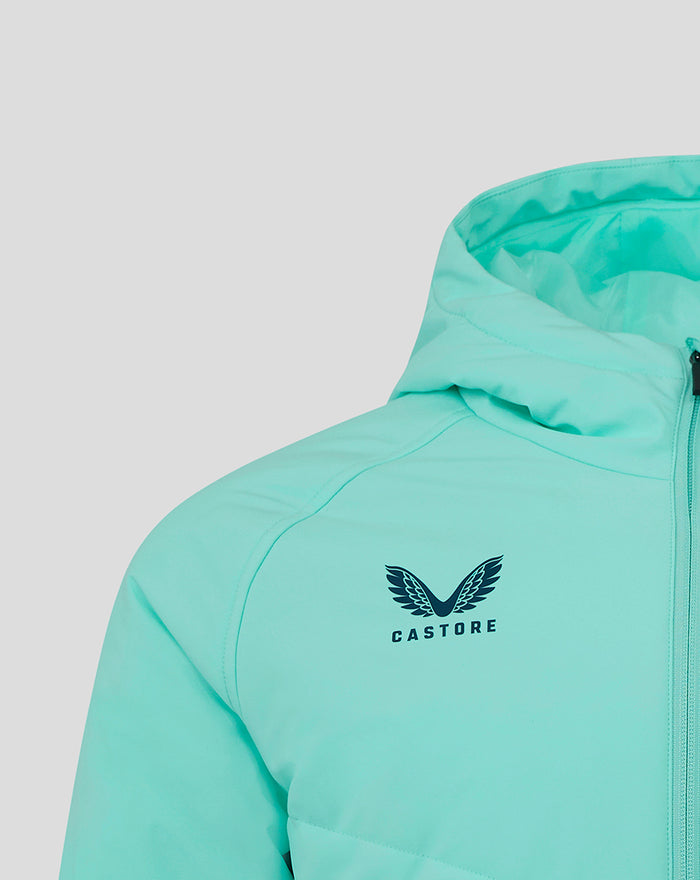 Close up of turquoise padded jacket chest showing the Castore logo and front zipper