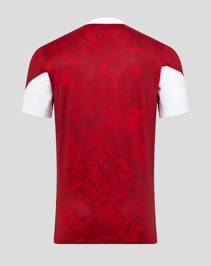 Back view of red Athletic Club home pre match short sleeve tee with tonal abstract print