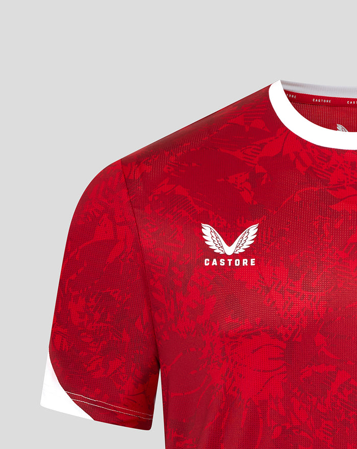 Red Athletic Club home jersey close up with white collar trim, Castore logo on the right chest and club crest on the left