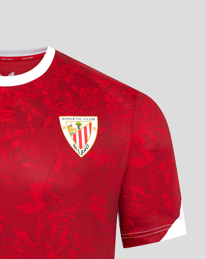 Red Athletic Club jersey close up showing club crest on the left chest and white sleeve trim