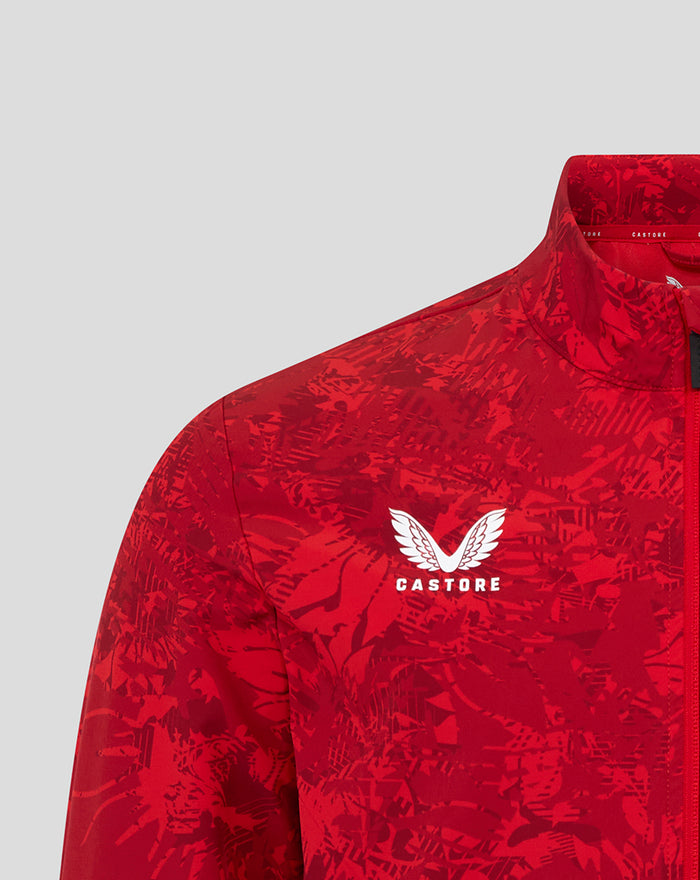 Close up of red camouflage Athletic Club Home Pre Match jacket with Castore logo on the chest.