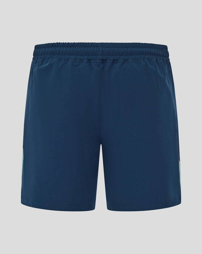 Close up of navy woven athletic shorts waistband with elastic and center back seam